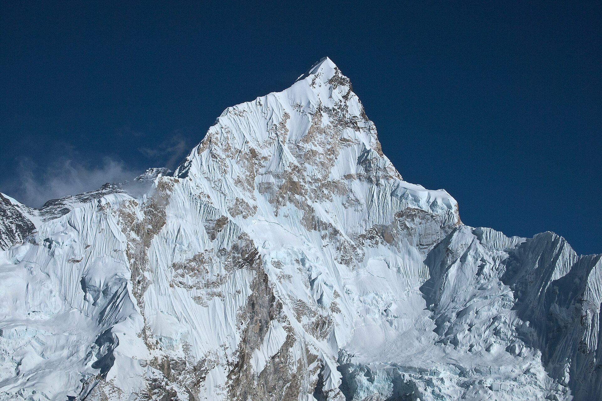 Ice walls of the Lhotse-Nuptse Massif West Face. Approach it and there is no beginning (7695), follow it and there is no end (7861). Nuptse mountain, Nepal, Mahalangur Himal, Himalayas.